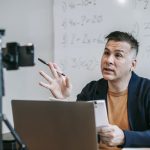 Photo Of Man Talking In Front Of Camera